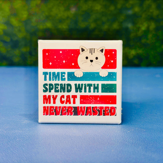 Retro-style square cat magnet featuring a tan cartoon cat and the bold phrase “Time Spend With My Cat Never Wasted” in red, teal, and navy block lettering. A fun and heartfelt gift for cat moms, pet owners, and feline enthusiasts. Perfect for decorating fridges, lockers, or office spaces. Makes a great stocking stuffer, birthday gift, or just-because treat for the cat-obsessed.