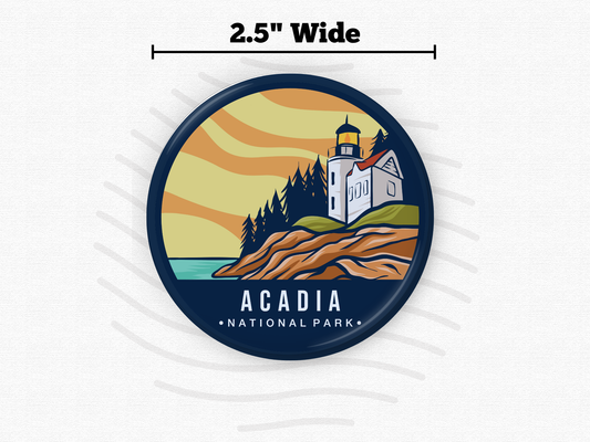 Acadia National Park round magnet with size reference – 2.5” wide magnet featuring a stylized lighthouse scene with cliffs and forest. Perfect for travel lovers, outdoor enthusiasts, or national park collectors.