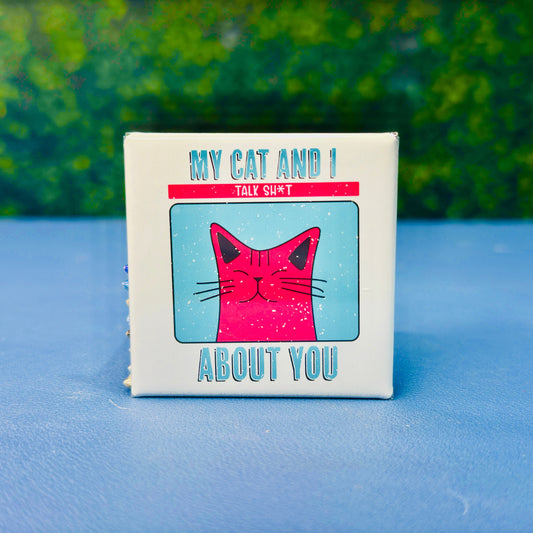 Square magnet with a retro-style pink cartoon cat in a teal box and the quote “My Cat and I Talk Sh*t About You.” Features distressed textures and bold fonts for a vintage look. A funny and sarcastic gift for cat moms, pet lovers, or introverts who appreciate edgy humor. Perfect for lockers, fridges, dorms, or workspaces. Great stocking stuffer or gag gift for feline fanatics.