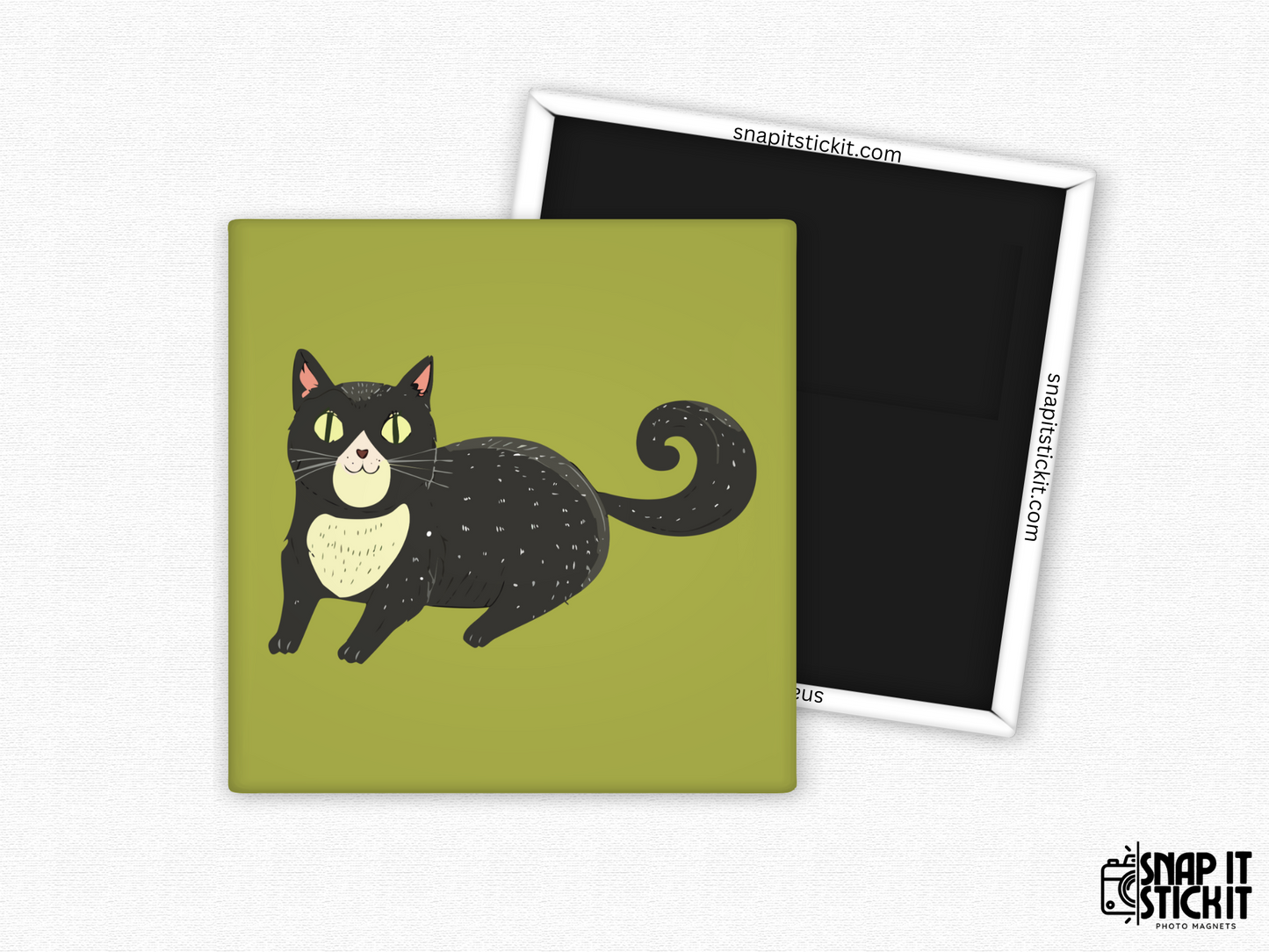 Cute black cat fridge magnet – 2x2” square magnet featuring a smiling cartoon black cat with yellow eyes, curly tail, and cream chest patch on a green background. Strong magnetic back with Snap It Stick It branding. Fun gift for cat lovers, Halloween fans, or quirky decor.