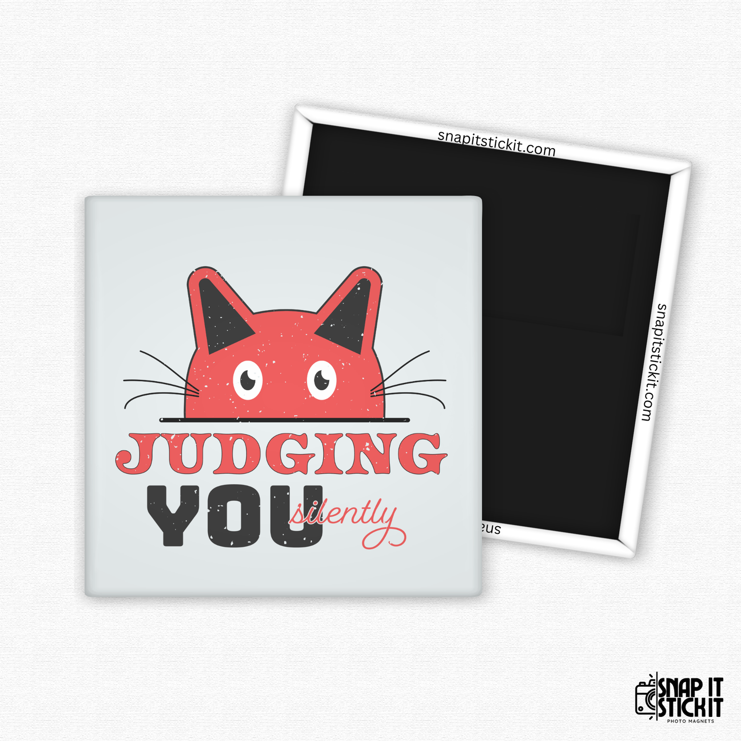 Fridge magnet with a red cat face and text 'Judging You Silently' on a white background.