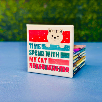 Retro-style square cat magnet featuring a tan cartoon cat and the bold phrase “Time Spend With My Cat Never Wasted” in red, teal, and navy block lettering. A fun and heartfelt gift for cat moms, pet owners, and feline enthusiasts. Perfect for decorating fridges, lockers, or office spaces. Makes a great stocking stuffer, birthday gift, or just-because treat for the cat-obsessed.