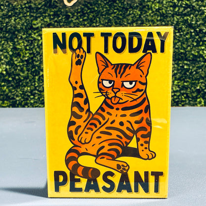 Magnet with bengal cat illustration and text 'Not Today Peasant' on a surface with a green textured background.