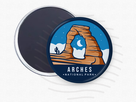 Arches National Park magnet – 2.5” round fridge magnet featuring an illustration of Delicate Arch under a starry sky with desert landscape and cacti. Magnet back partially shown. A great souvenir for hikers, desert explorers, and national park enthusiasts.