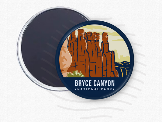 Round magnet of Bryce Canyon National Park showcasing tall red rock hoodoos under a pale yellow sky with distant canyon ridges.”
