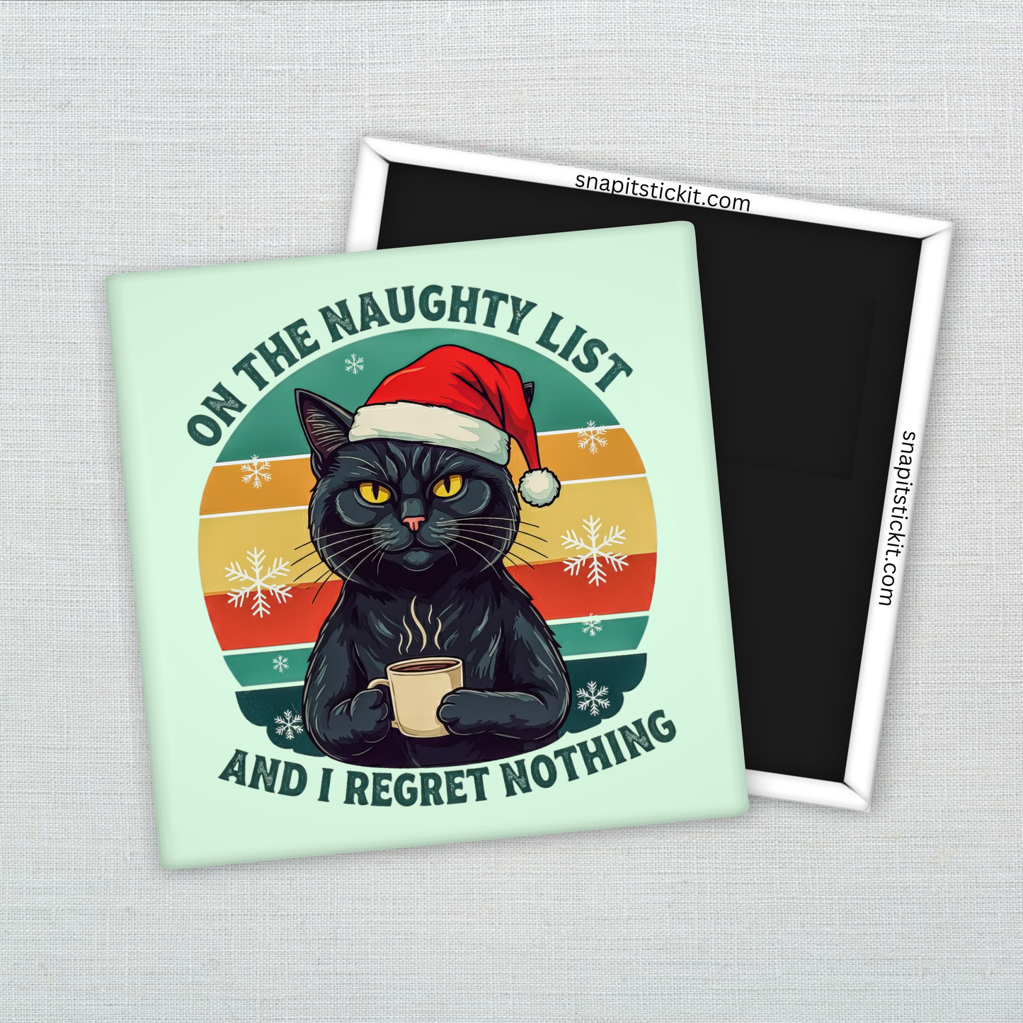 Black cat in a Santa hat holding a mug with retro sunset stripes and snowflakes in the background. Quote: “On the Naughty List and I Regret Nothing.” Funny 2x2 magnet.