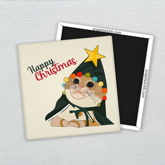 Orange cat dressed as a Christmas tree with tangled lights and a star on its head, under the words “Happy Christmas.” Funny 2x2 holiday magnet.