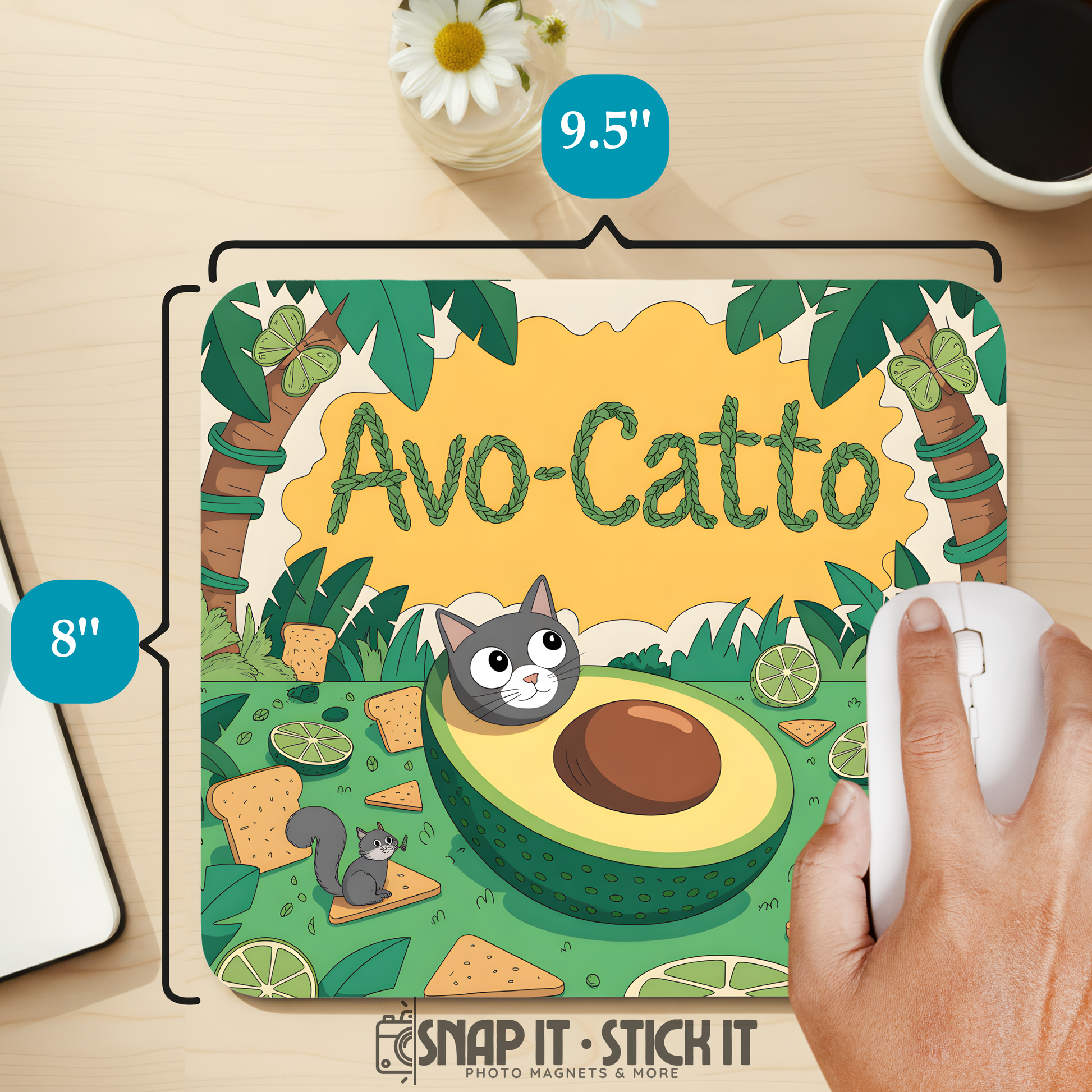 Avocado-themed mouse pad with 'Avo-Catto' text and a hand using a mouse, on a desk with a coffee cup and flowers.