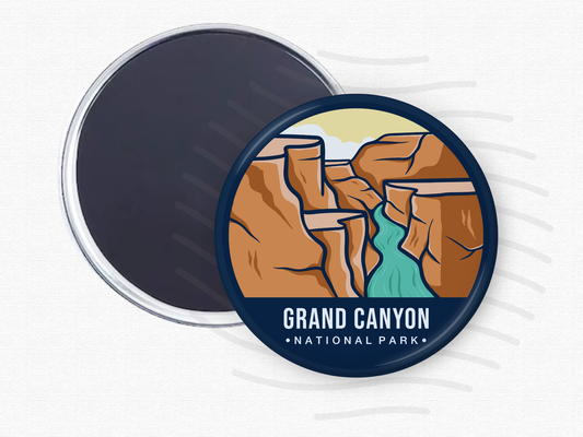 Round magnet of Grand Canyon National Park depicting layered red rock canyons with a turquoise river winding through the center under a light sky.