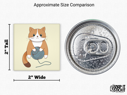 Cat with yarn magnet size comparison – 2x2” square fridge magnet showing an orange cartoon cat playing with blue yarn, next to a soda can. Cute cat magnet perfect for fridge, locker, or small gift for knitters and pet parents.