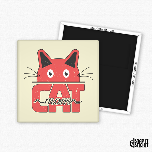 Fridge magnet with red cat illustration and 'cat mom' text on a beige background