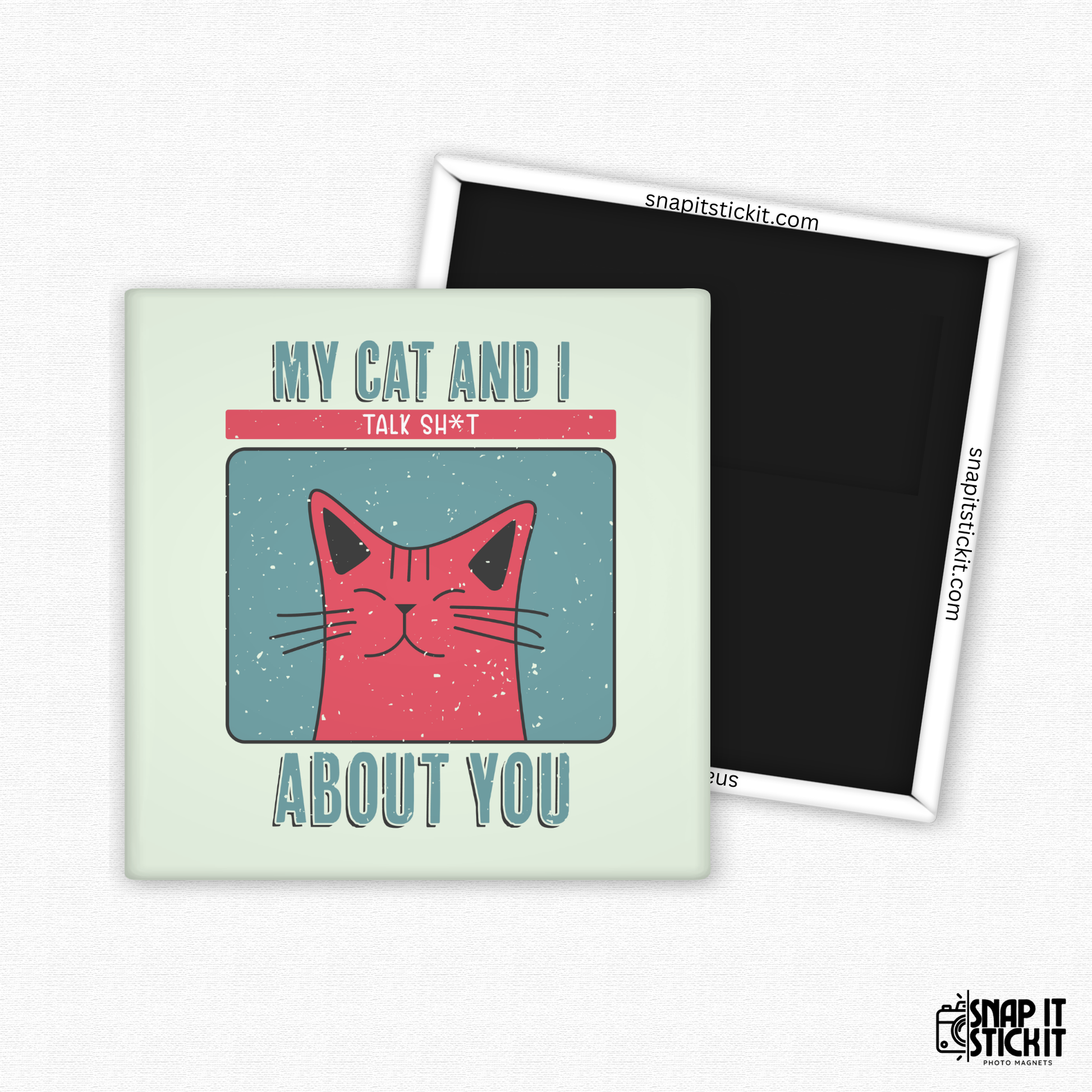 Fridge magnet with a cat illustration and text on a light green background