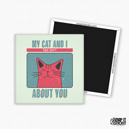 Fridge magnet with a cat illustration and text on a light green background