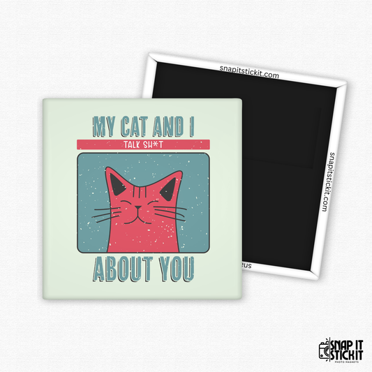 Fridge magnet with a cat illustration and text on a light green background