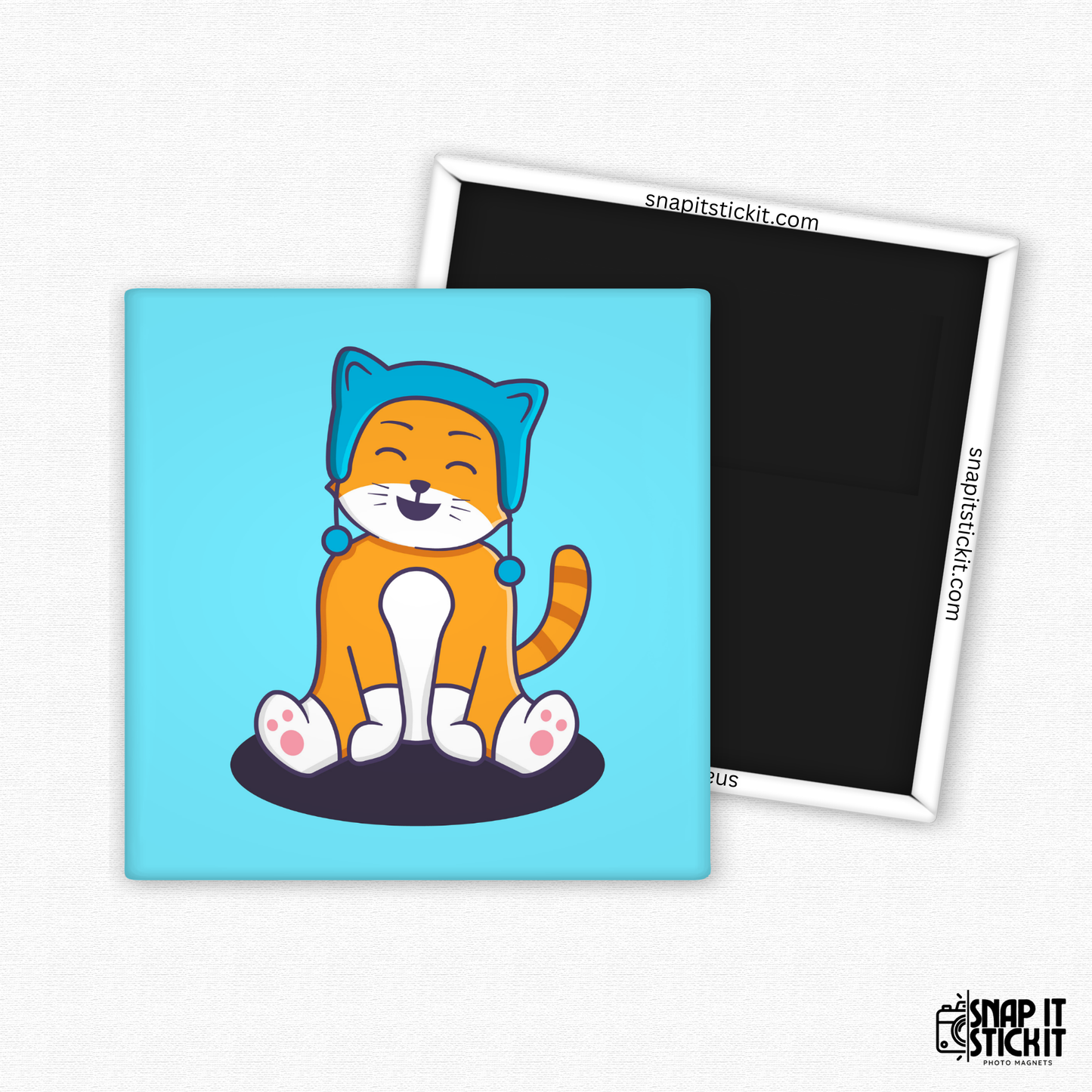 Fridge magnet with a cartoon cat design on a blue background