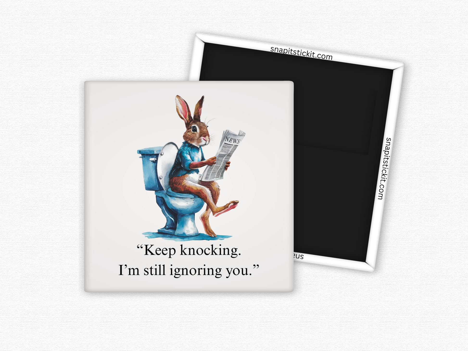 Funny rabbit bathroom magnet with a bunny on the toilet reading a newspaper and the quote “Keep knocking, I’m still ignoring you.”
