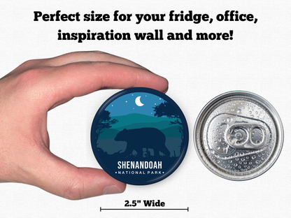 National Park magnet size reference – 2.5” round magnet held in hand next to a soda can, with text stating “Perfect size for your fridge, office, inspiration wall and more!” Design features a bear silhouette under a crescent moon with layered mountain scenery. Ideal for national park fans, travelers, or outdoor lovers.
